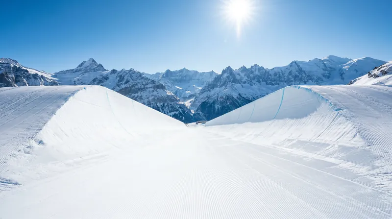 The 22-foot superpipe serves as the exclusive battleground for The Snow League's head-to-head format.