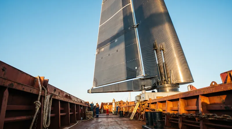 Rigid wing sails are fully automated, using AI to adjust their angle for maximum thrust without manual crew intervention.
