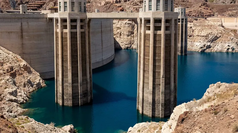 If water levels drop below the intake towers at Hoover Dam, the system will reach 'dead pool,' halting downstream flow and power generation.
