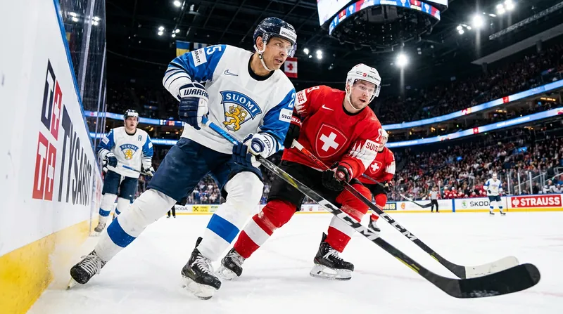 Finland edged out Switzerland 1-0 in overtime to claim IIHF gold.