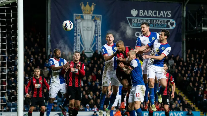 Executing complex routines requires intense physical commitment and precise timing in crowded penalty areas.