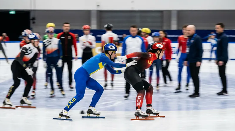 The physical push exchange transfers kinetic energy between relay teammates.