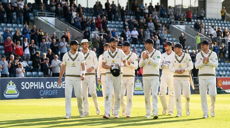 Glamorgan secured a historic seven-wicket victory over Surrey at Sophia Gardens.