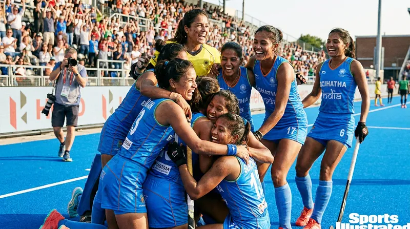 The Indian women's team celebrates their Nations Cup victory and promotion to the Pro League.