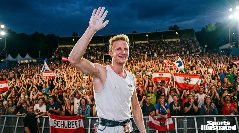 Hometown hero Jakob Schubert celebrates his bronze medal, which tied the all-time record for career podiums.
