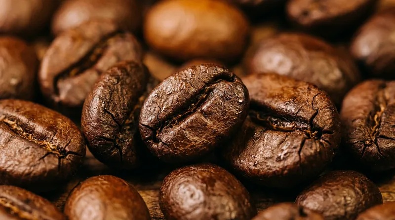 Because decaffeination alters the cellular structure of the bean, decaf coffee often roasts darker and releases surface oils faster.