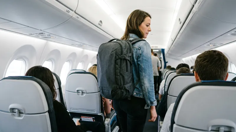 Traveling exclusively with an under-seat personal item avoids all overhead bin fees but restricts packing volume to roughly 25 liters.
