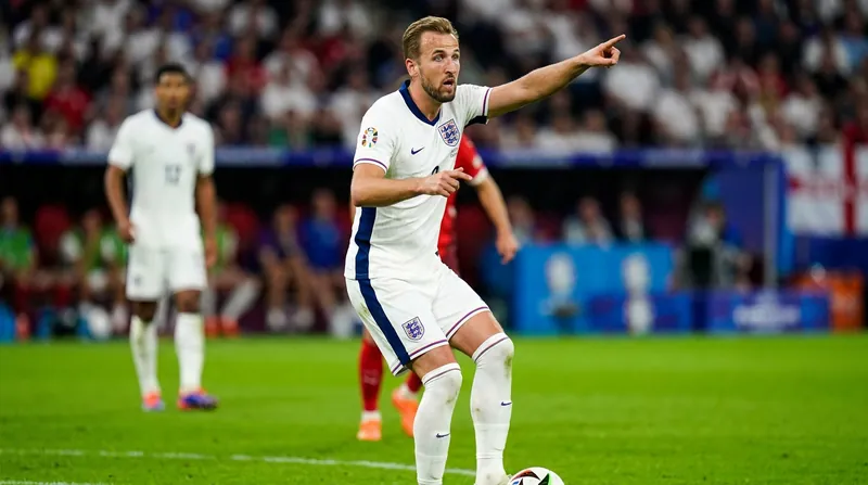 Harry Kane's role has evolved into a hybrid playmaker, dropping deep to pull center-backs out of position.