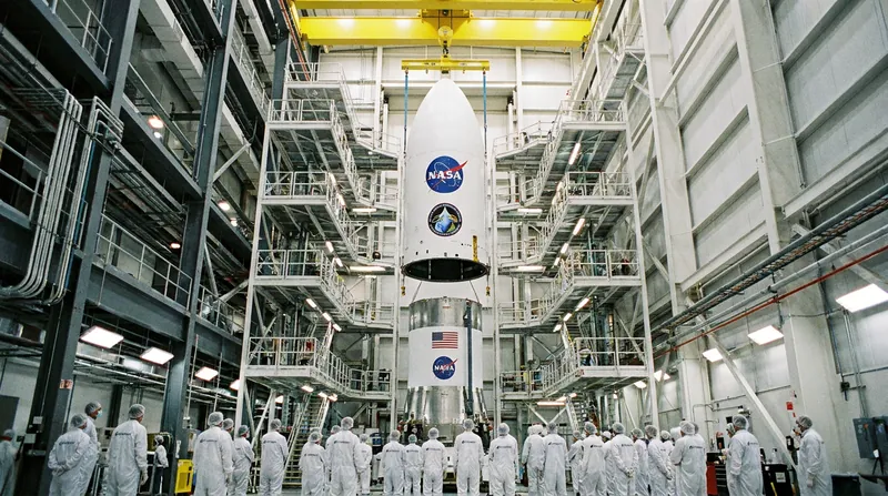 Satellites are encapsulated in the payload fairing before being transported to the launch pad.
