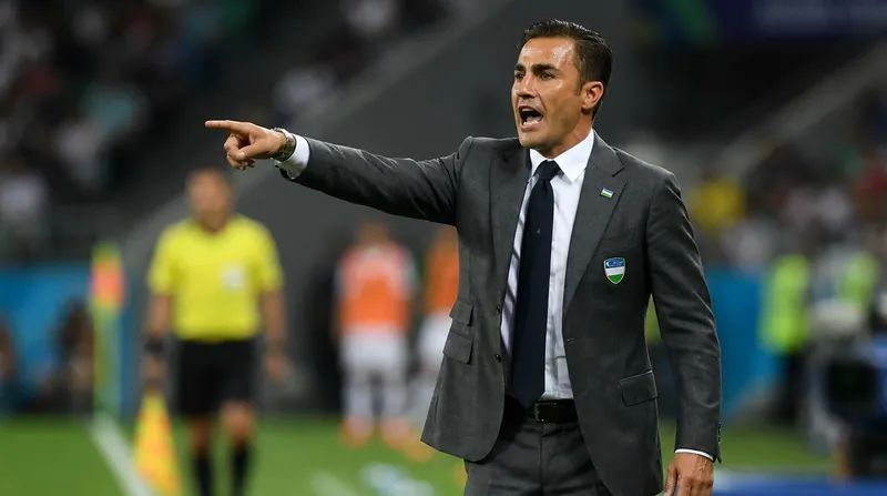 Italy's 2006 World Cup-winning captain Fabio Cannavaro stepped in to guide Uzbekistan across the finish line.