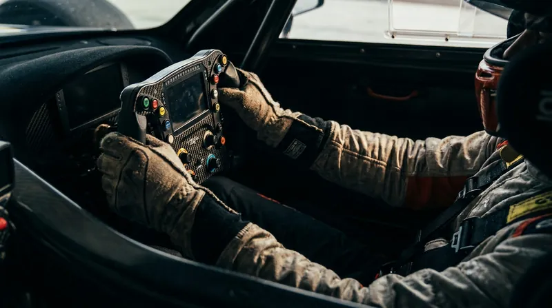 Open-wheel racing places immense physical strain on the hands and wrists, making rapid surgical recovery crucial.