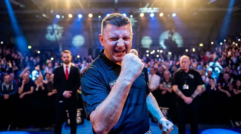 Normally stoic, Ratajski showed rare emotion after surviving match darts to complete his World Championship comeback.