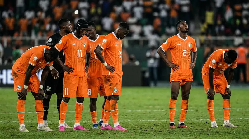 Ivory Coast players react following the final whistle after a disciplined defensive performance.