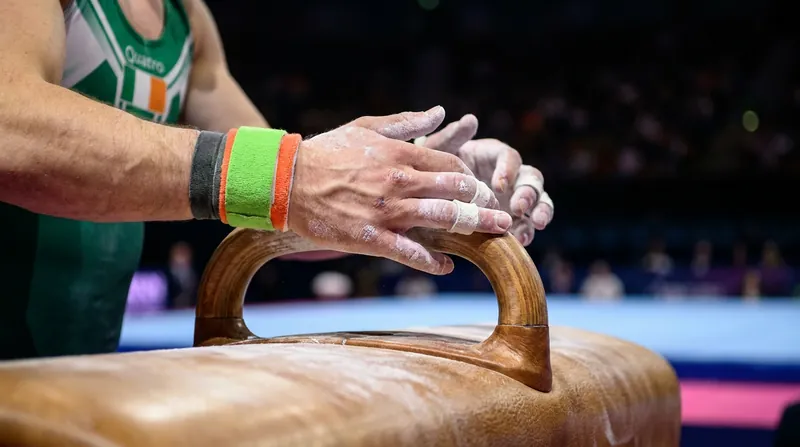 The pommel horse places immense rotational stress on the shoulders and wrists, making AC joint injuries a common occupational hazard.