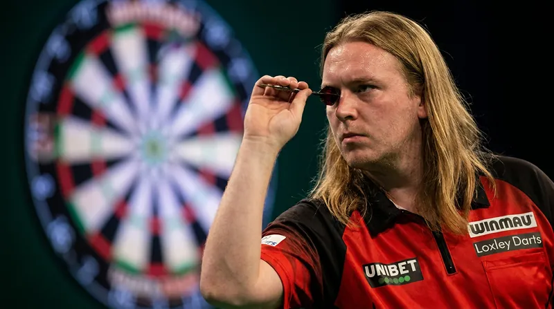 Ryan Searle relies on muscle memory to compete, as his genetic eye condition blurs the dartboard from the oche.