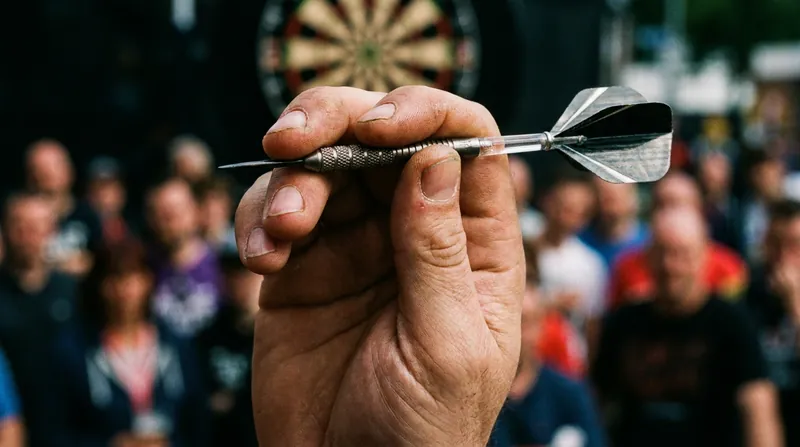 Dartitis disrupts the fine motor skills required to smoothly release the dart at the optimal moment.