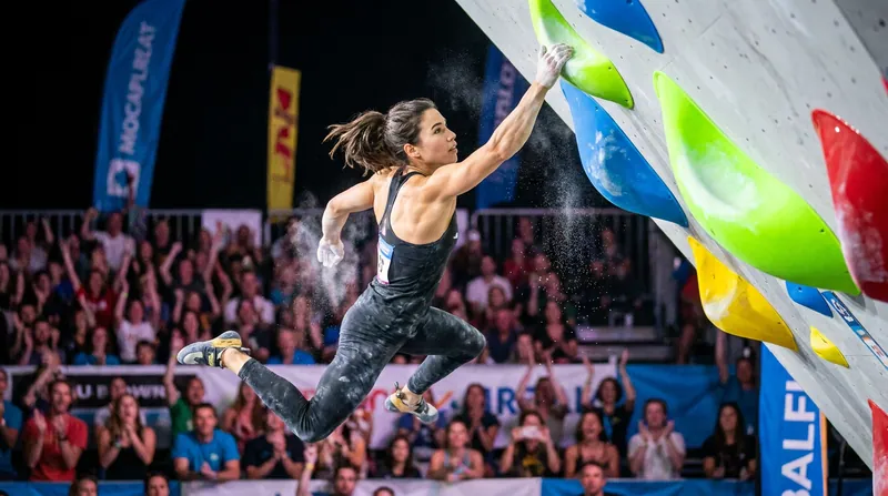 Dynamic, parkour-style bouldering routes place immense biomechanical strain on athletes' joints and tendons.