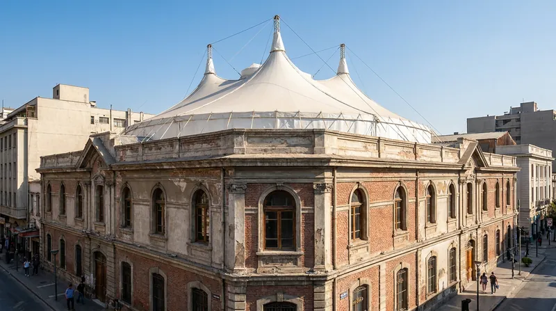 For the NAVE cultural center in Santiago, Radić preserved a fire-damaged historic shell and topped it with a circus tent.