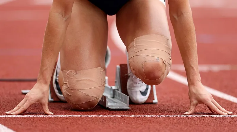 Keely Hodgkinson raced to a second-place finish in Eugene despite severe knee bruising that left her unable to walk just days prior.