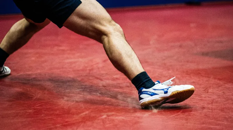 The constant lateral shuffling and deep knee flexion required in professional table tennis generate immense cumulative strain on the lower body.