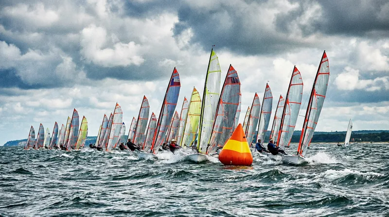 More than 90 sailors from 13 nations navigated the challenging racecourse after initial storm delays.