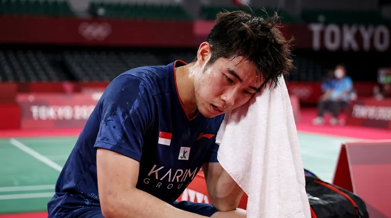 Loh Kean Yew battled through a grueling 59-minute match just weeks after recovering from an abdominal injury.