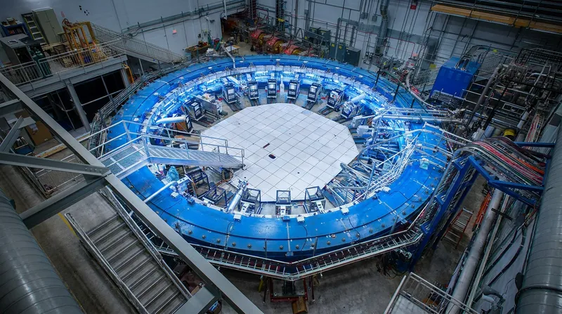 A muon's magnetic wobble is influenced by virtual particles popping in and out of the quantum vacuum.