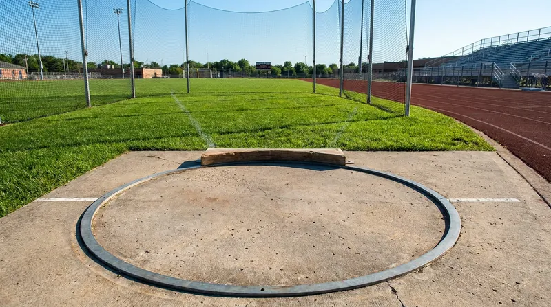 New NFHS rule changes will mandate forward-facing warmups in the shot put and discus to reduce injury risks.