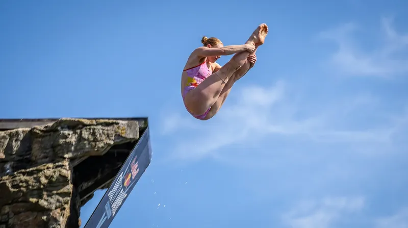 Kaylea Arnett executed a flawless reverse triple pike in the final round to secure her maiden World Cup gold.