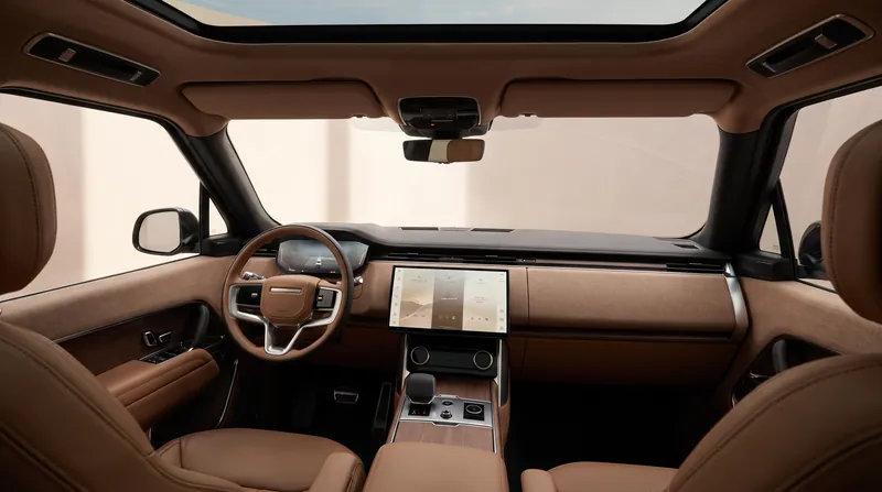 The GT's 'reductive' interior eliminates the traditional instrument binnacle and physical buttons in favor of hidden technology.