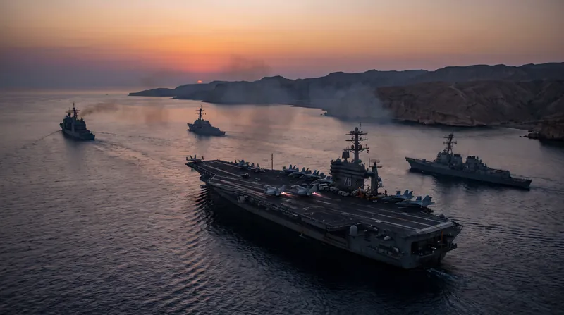 A U.S. Navy strike group patrols the Strait of Hormuz amid escalating tensions with Iran.