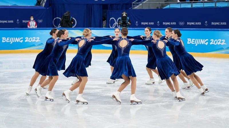 The addition of Synchro9, a modernized nine-person synchronized skating event, provided the female athlete quotas necessary to reach parity.
