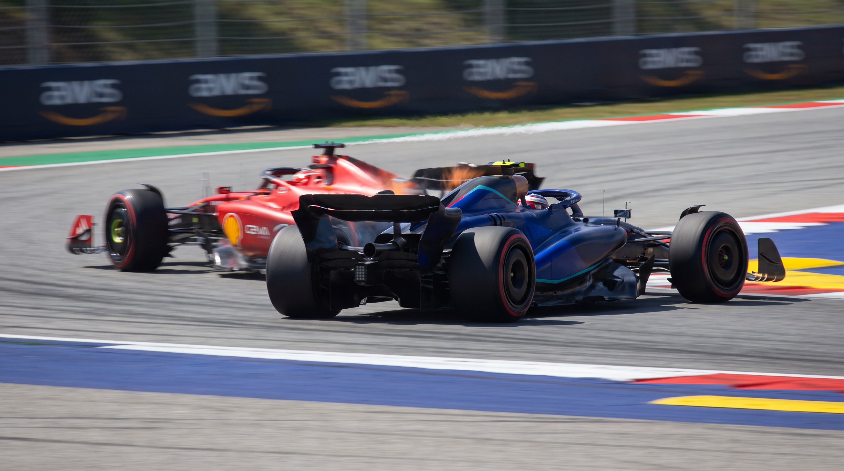Max Verstappen executed a brilliant Turn 1 overtake to secure second place despite struggling with car balance.