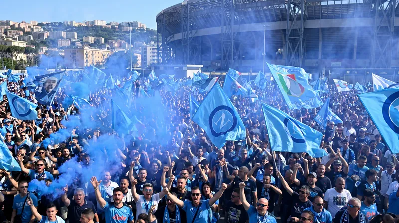 Napoli supporters gather outside the stadium, embracing the club's ambitious new direction.