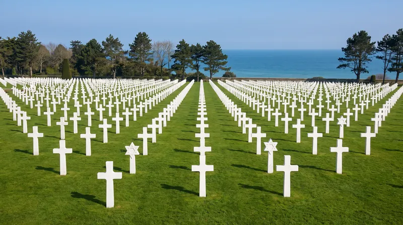 The physical remnants of the 1944 Allied landings serve as anchors for an intangible message of peace and remembrance.