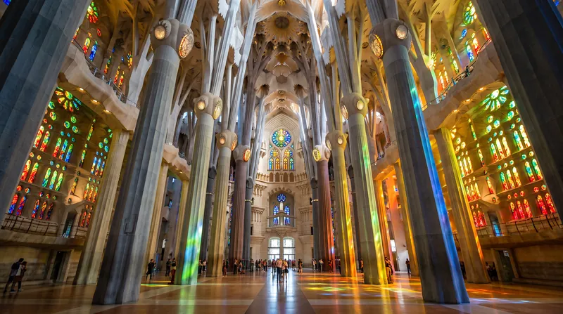 The interior nave was designed by Gaudí to mimic a vast, light-filled spiritual forest.