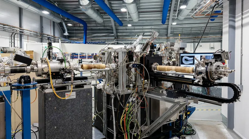Synchrotron facilities, like the Diamond Light Source in the UK, generate the high-resolution X-rays required to peer inside the carbonized scrolls.