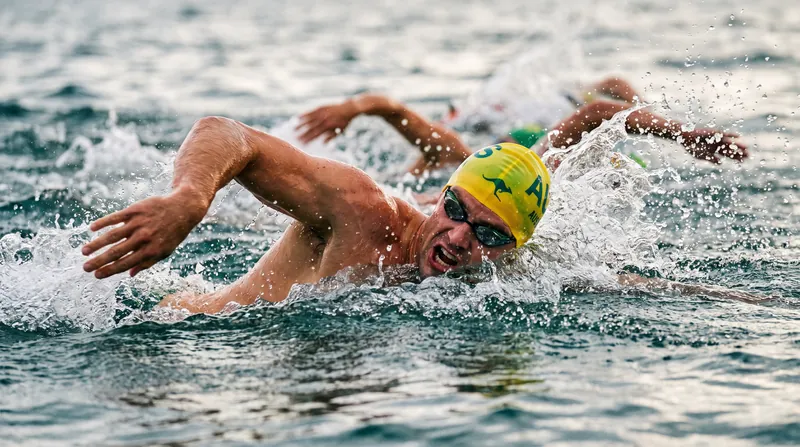 Australia's Sam Short swept the distance freestyle events, breaking a 24-year-old championship record in the 1500m.