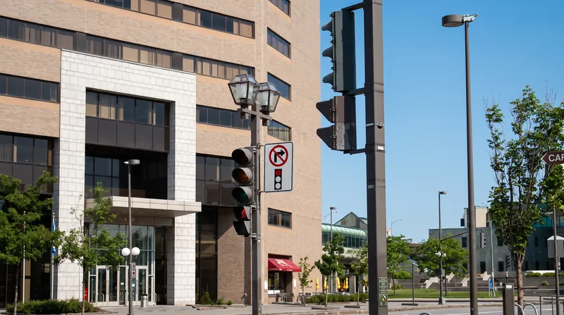 The city will install new signage at 30 pilot intersections, followed by a 30-day education period before enforcement begins.