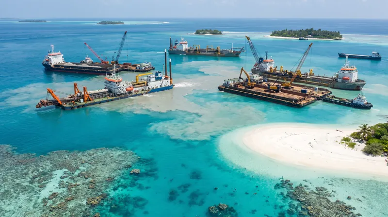 Dozens of dredging vessels were deployed to pump sand from the seabed, forming the island in under a year.
