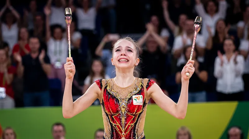 Bulgaria's Stiliana Nikolova celebrates her gold medal in the clubs apparatus final, her first senior world title.