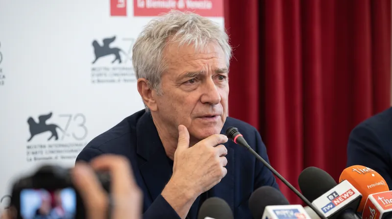 Director Martin McDonagh discusses the film's pivot from a simple comedy to a darker exploration of US foreign policy.