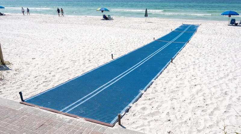 Accessibility infrastructure, including specialized beach matting and nearby disabled parking, is a non-negotiable requirement for participating municipalities.