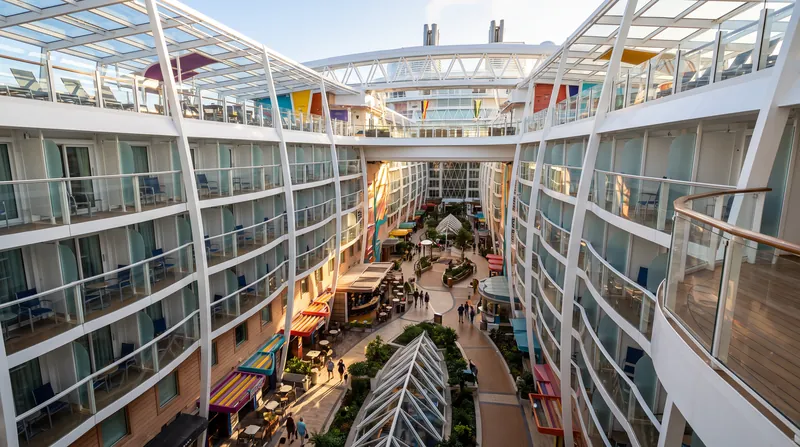 Open-air spaces like central boardwalks do not count toward a ship's taxable Gross Tonnage.