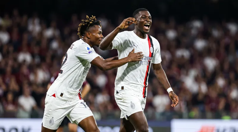 Alphadjo Cissé celebrates putting AC Milan ahead in the 68th minute.