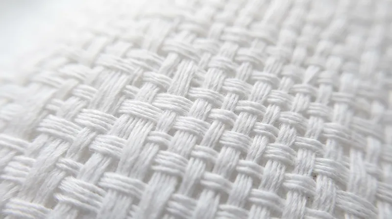 The classic one-over, one-under percale weave provides the signature crisp snap of a hotel bed.