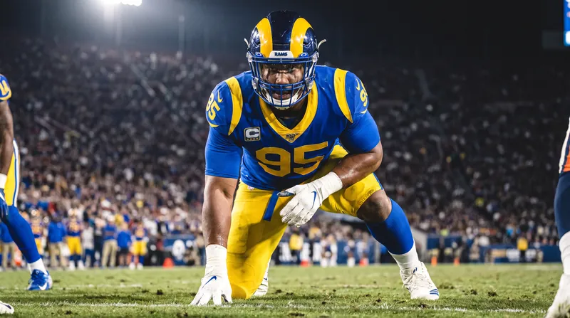 Reigning Defensive Player of the Year Myles Garrett makes his Los Angeles Rams debut in Melbourne.