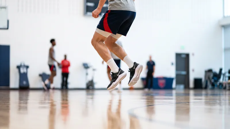 Exercises like pogo hops train the nervous system to pre-activate the calf muscles before the foot strikes the ground.