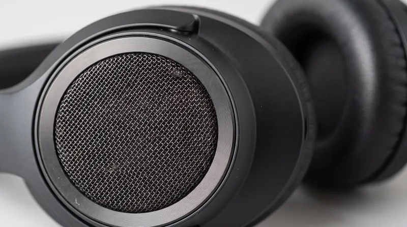 External feedforward microphones hear ambient noise before it reaches the ear, allowing the processor to react instantly.