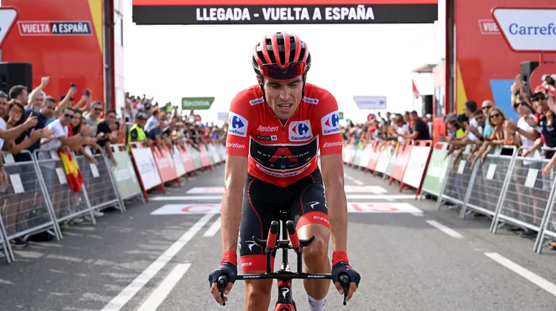 Enric Mas produced the time trial of his life to defend the red jersey against Primož Roglič.